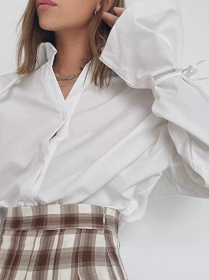 Elegant White Lace-Up Blouse