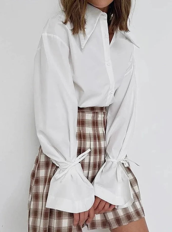 Elegant White Lace-Up Blouse